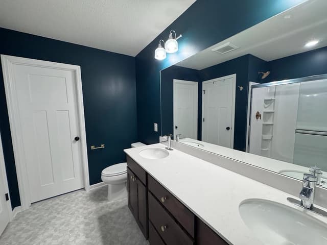 White Chooz Painters logo with blue background placeholder for paintig company logos