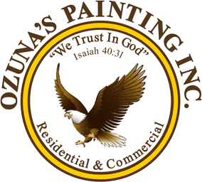 This is an image from Ozuna’s Painting Inc., located in Louisiana. The logo for Ozuna’s Painting Inc. features a soaring bald eagle inside a circular gold and brown emblem with the text ‘We Trust In God’ and ‘Residential & Commercial’ around the border.