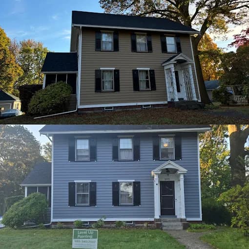This is an image from Level Up Painting, located in New York. The before-and-after exterior photo shows a two-story home repainted from beige to a blue-gray color with refreshed white trim and black shutters.