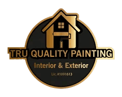 This is an image from Tru Quality Painting, located in California. The image shows a freshly painted single-story residential home exterior with white garage doors, light neutral siding, dark trim accents, and a clean, modern curb appeal.