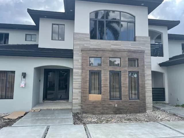 White Chooz Painters logo with blue background placeholder for paintig company logos