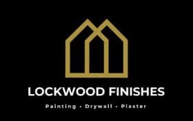 This is an image from Lockwood Finishes, located in Illinois. The logo for Lockwood Finishes features white text on a black background with a gold geometric house-shaped line graphic.