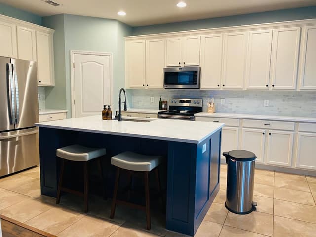 White Chooz Painters logo with blue background placeholder for paintig company logos