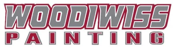 This is an image from Woodiwiss, located in California. The image is the Woodiwiss Painting company logo featuring bold gray lettering with red outlines spelling the business name.
