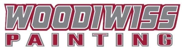 This is an image from Woodiwiss, located in California. The image is the Woodiwiss Painting company logo featuring bold gray lettering with red outlines spelling the business name.