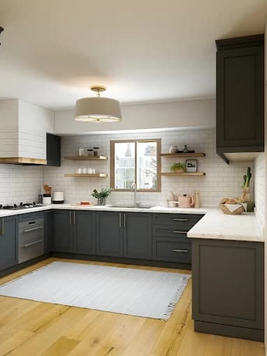 This is an image from Hometown Painting, located in Oklahoma. The photo shows a modern kitchen with freshly painted dark gray cabinets, white subway tile backsplash, light countertops, and natural wood accents.
