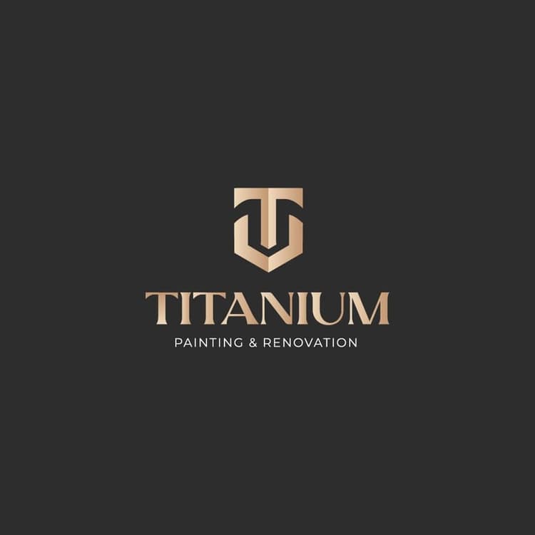 This is the logo of Titanium Painting & Renovations. The design features a modern gold-toned monogram "T" above the company name on a dark background, symbolizing premium painting and renovation services.