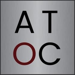 This is an image from A Touch of Color Painting & General Contracting LLC, located in North Carolina. The logo for A Touch of Color features the letters 'AT' in black and 'OC' in red on a brushed silver background, representing the company’s modern and professional identity.