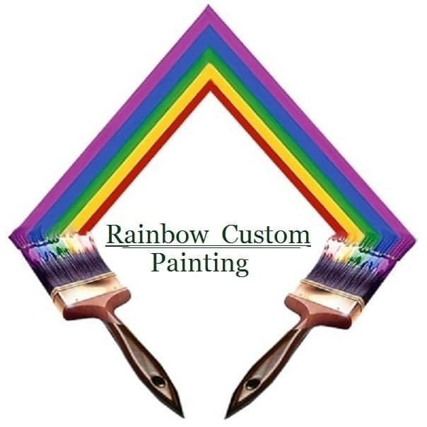 This is an image from Rainbow Custom Painting of Santa Barbara & Montecito, located in California. The logo for Rainbow Custom Painting of Santa Barbara & Montecito features two paintbrushes forming a rainbow arc with multicolored paint strokes.