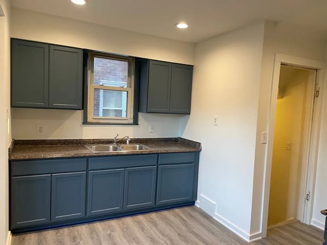 White Chooz Painters logo with blue background placeholder for paintig company logos