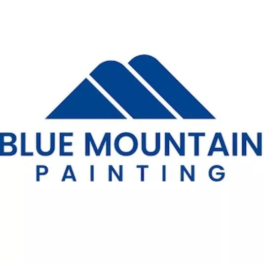 This is an image from Blue Mountain Painting, located in Colorado. The logo features a minimalist blue mountain design above the company name in bold blue text.