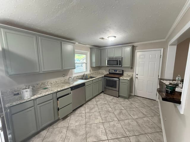 White Chooz Painters logo with blue background placeholder for paintig company logos