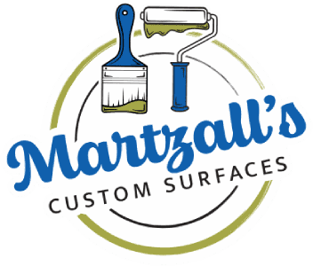 This is an image from Martzall's Custom Surfaces, located in Pennsylvania. The logo for Martzall's Custom Surfaces features a paint roller and brush graphic with stylized blue text and a circular design.