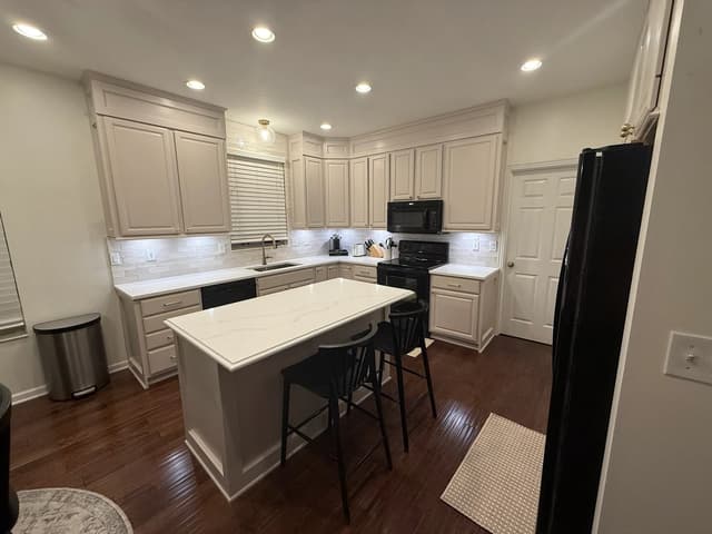 White Chooz Painters logo with blue background placeholder for paintig company logos