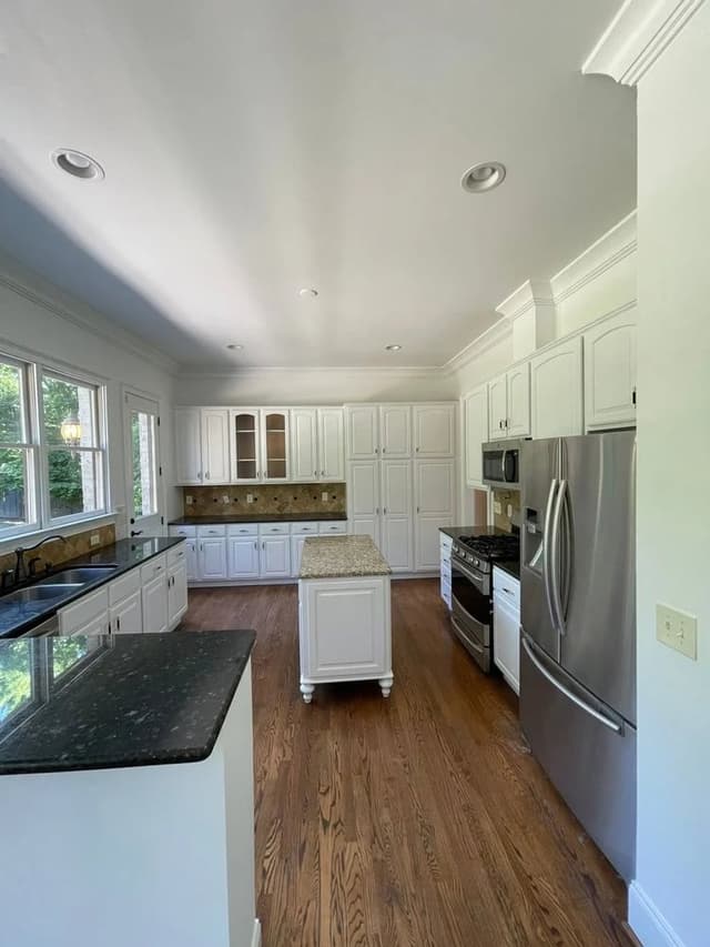 White Chooz Painters logo with blue background placeholder for paintig company logos