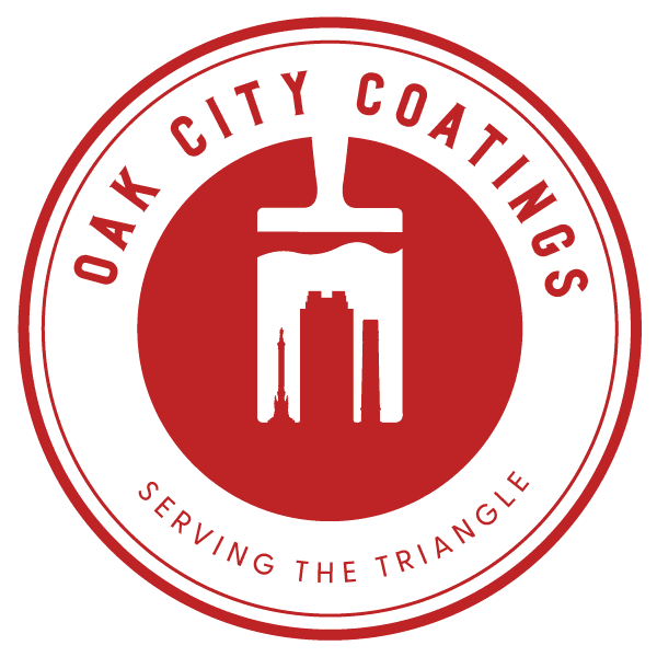 This is an image fromThe Oak City Coatings, Painting Division, located in North Carolina. This is a Oak City Coatings company logo featuring a red circular emblem with a white paintbrush silhouette and skyline inside, with the words “Oak City Coatings – Serving the Triangle.”