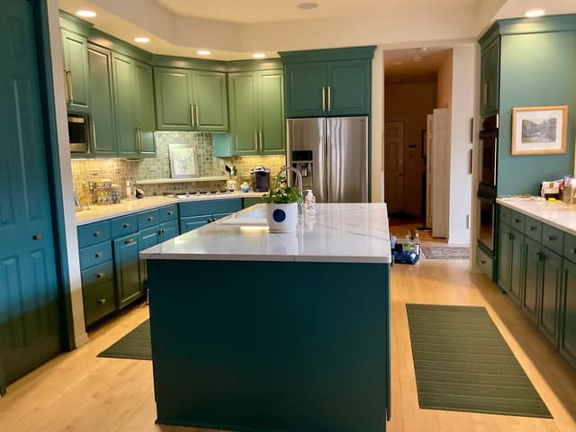 White Chooz Painters logo with blue background placeholder for paintig company logos