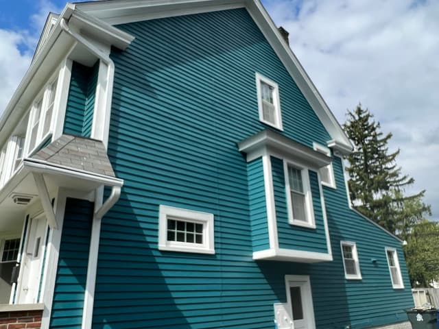 White Chooz Painters logo with blue background placeholder for paintig company logos