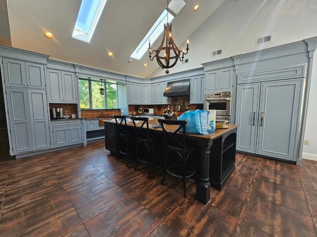 White Chooz Painters logo with blue background placeholder for paintig company logos