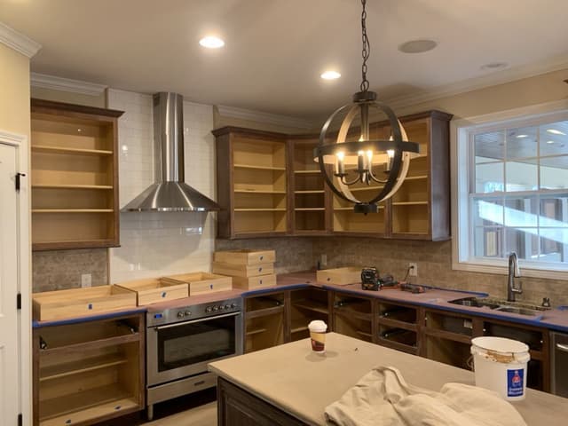 White Chooz Painters logo with blue background placeholder for paintig company logos