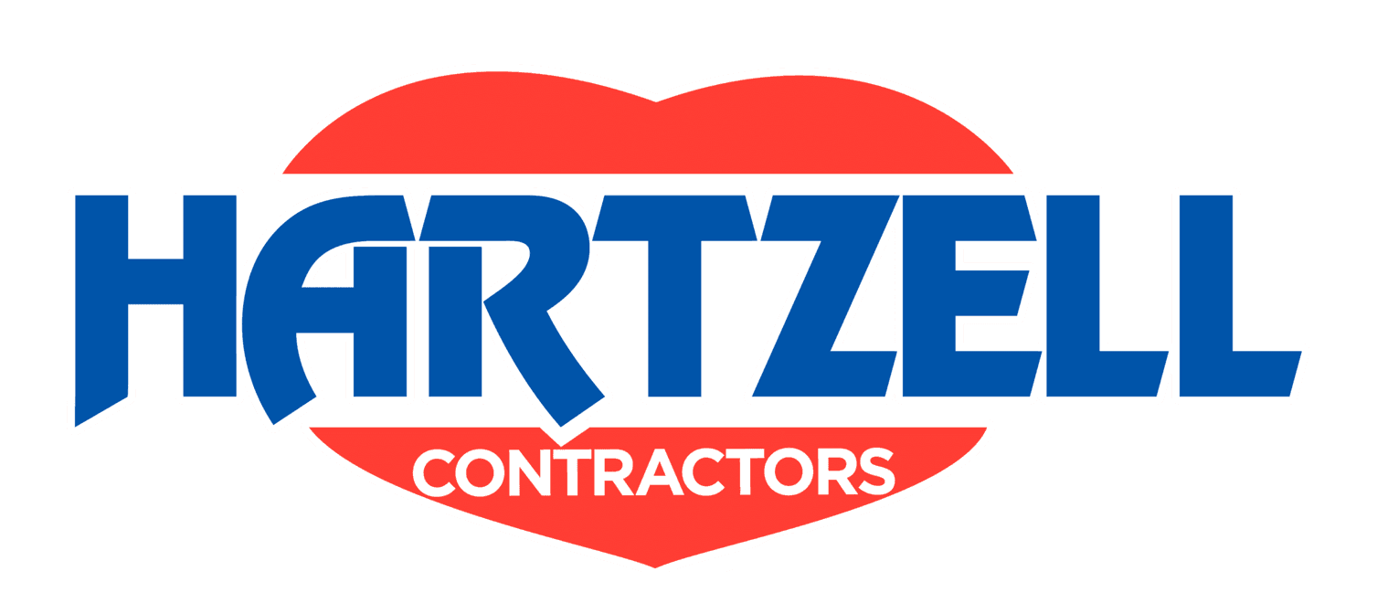 This is an image from Hartzell Contractors, located in Florida. The logo for Hartzell Contractors features bold blue text over a red heart-shaped background with the word 'Contractors' below.