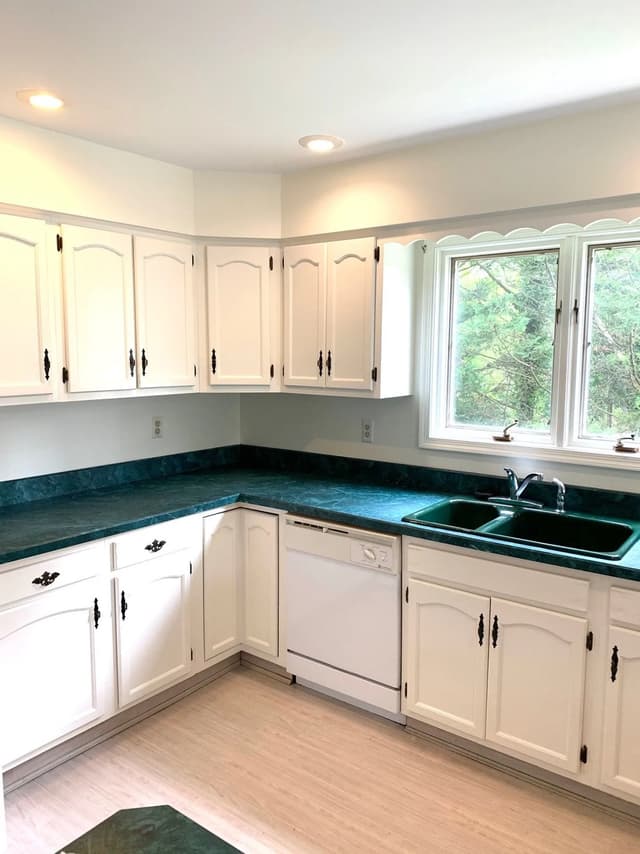 White Chooz Painters logo with blue background placeholder for paintig company logos