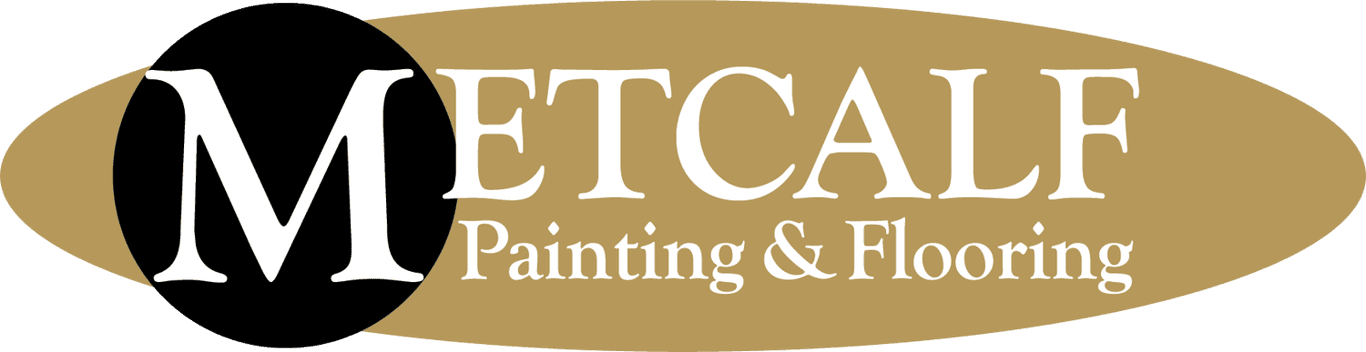 This is an image from Metcalf Painting & Flooring, located in North Carolina. The logo for Metcalf Painting & Flooring features a bold white 'M' on a black circle set against a gold oval background with elegant serif lettering in white.