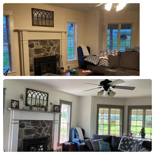 This is an image from Carrigan Painting, located in Wisconsin. The image shows a living room interior painting project with updated wall colors, a stone fireplace, and improved natural light throughout the space.