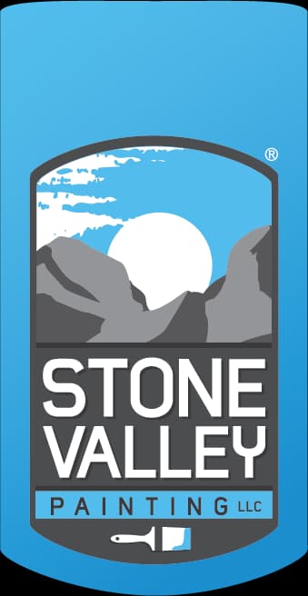 This is an image from Stone Valley Contractors, located in Minnesota. The logo for Stone Valley Contractors features a blue shield design with mountain graphics, a rising sun, and bold white lettering.