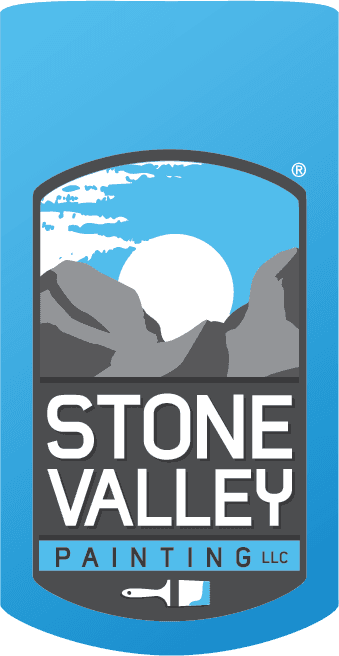 This is an image from Stone Valley Contractors, located in Minnesota. The logo for Stone Valley Contractors features a blue shield design with mountain graphics, a rising sun, and bold white lettering.