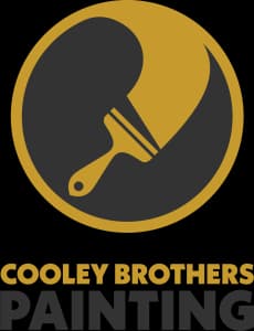 This is an image from Cooley Brothers Painting, located in California. The image shows the official company logo featuring a stylized paintbrush icon and bold lettering, representing professional residential and commercial interior and exterior painting services.