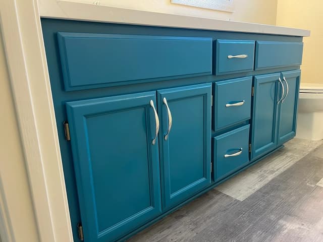 White Chooz Painters logo with blue background placeholder for paintig company logos