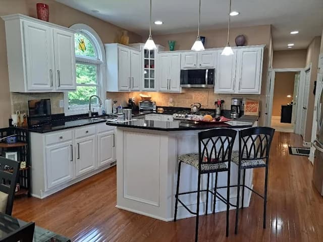 White Chooz Painters logo with blue background placeholder for paintig company logos