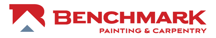 This is an image from Benchmark Painting & Carpentry, located in Florida. The logo for Benchmark Painting & Carpentry features a bold red and black design with a stylized arrow and modern text.