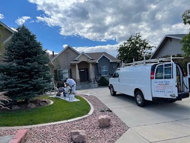 Exterior painting by All Painting Plus 2, LLC in Colorado Springs, Colorado. The image shows a house and company van.