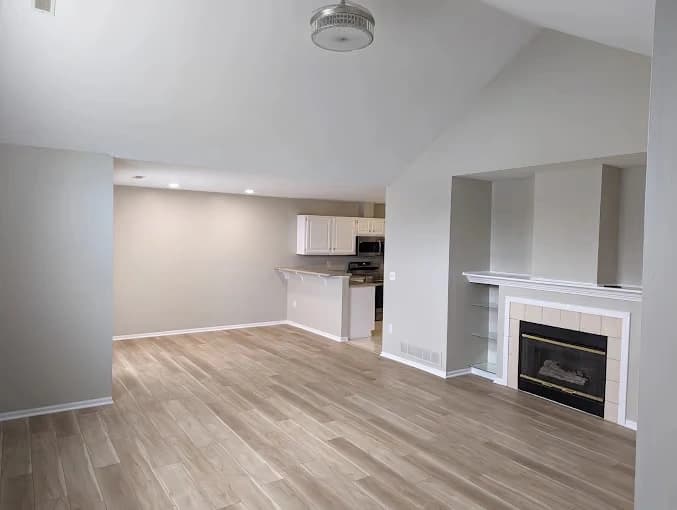 Interior painting by 360 Painting of Columbus in Reynoldsburg, Ohio. The image shows gray walls beside a white fireplace.