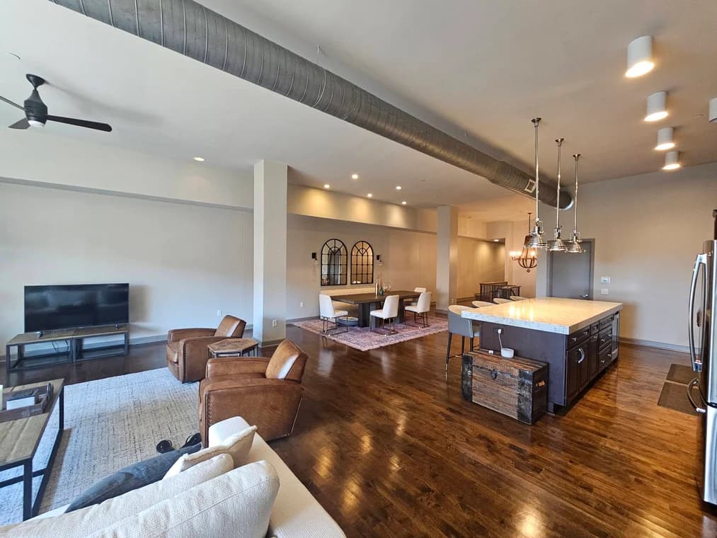Interior painting by Promus Home Improvement Co in Grove City, Ohio. The image shows white walls around a kitchen.