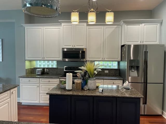 White Chooz Painters logo with blue background placeholder for paintig company logos