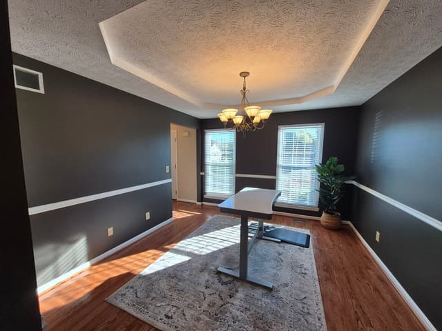 White Chooz Painters logo with blue background placeholder for paintig company logos