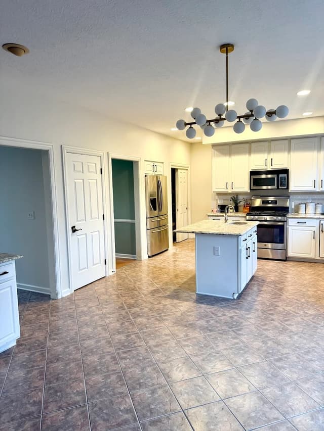 White Chooz Painters logo with blue background placeholder for paintig company logos