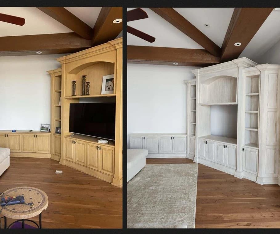 This is an image from Creative Colors And Design company, located in Naples, FL. The image is a before and after built-in entertainment center cabinet refinishing in a living room with exposed beams, transforming from honey oak wood to a modern whitewashed finish by Creative Colors and Design