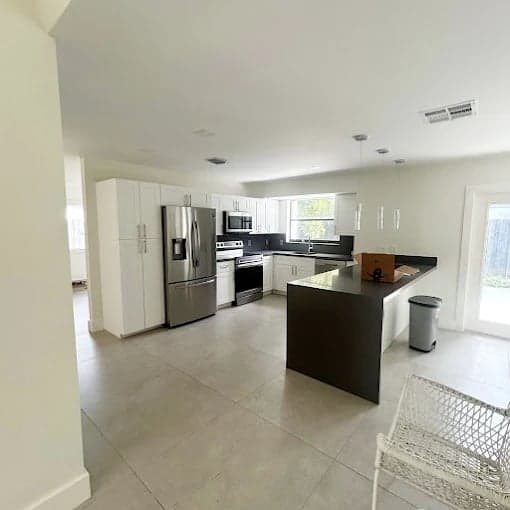 White Chooz Painters logo with blue background placeholder for paintig company logos