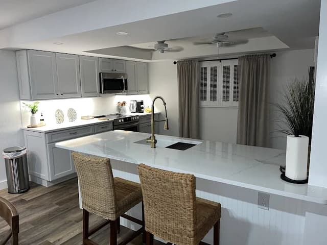 White Chooz Painters logo with blue background placeholder for paintig company logos