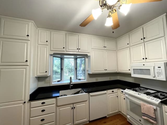 White Chooz Painters logo with blue background placeholder for paintig company logos