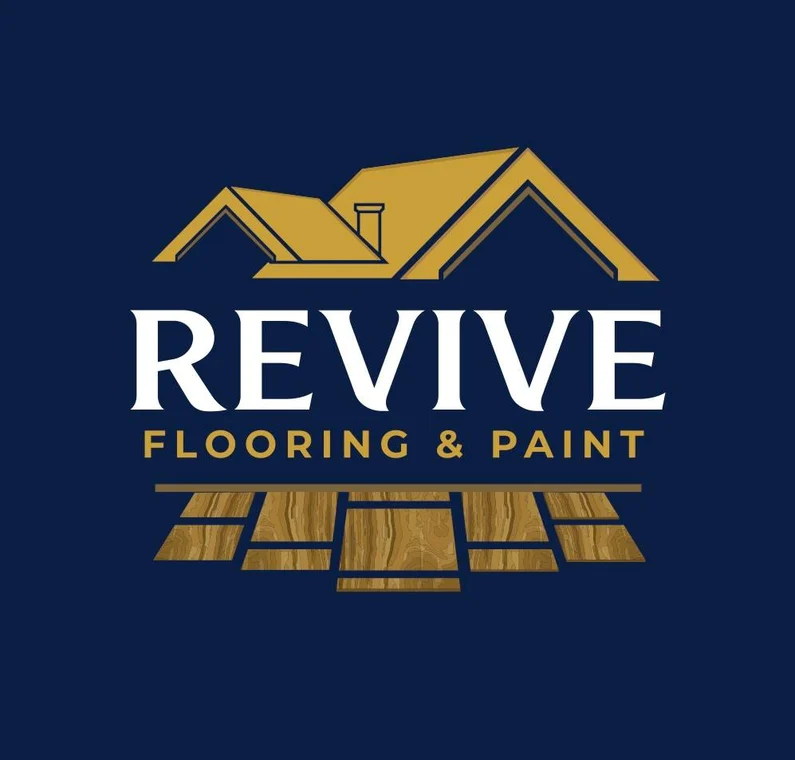 This is an image from Revive Flooring & Paint, located in Pennsylvania. The logo for Revive Flooring & Paint features navy and gold text with a roofline graphic above and wood flooring planks below.