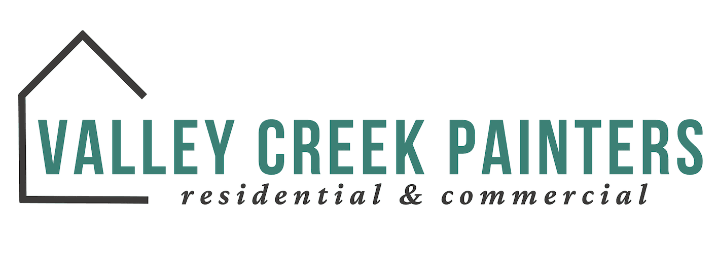 This is an image from Valley Creek Painters, located in Minnesota. The logo for Valley Creek Painters features green uppercase lettering with a simple house outline and the words residential and commercial beneath the company name.