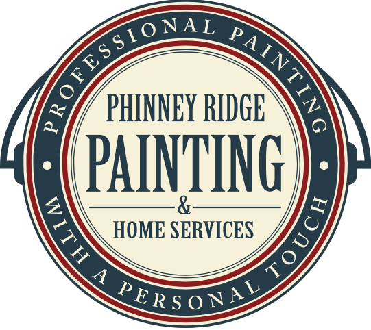 This is an image from Phinney Ridge Painting & Home Services, located in Washington. The logo for Phinney Ridge Painting & Home Services features a circular badge design with navy, cream, and red colors and bold serif lettering.