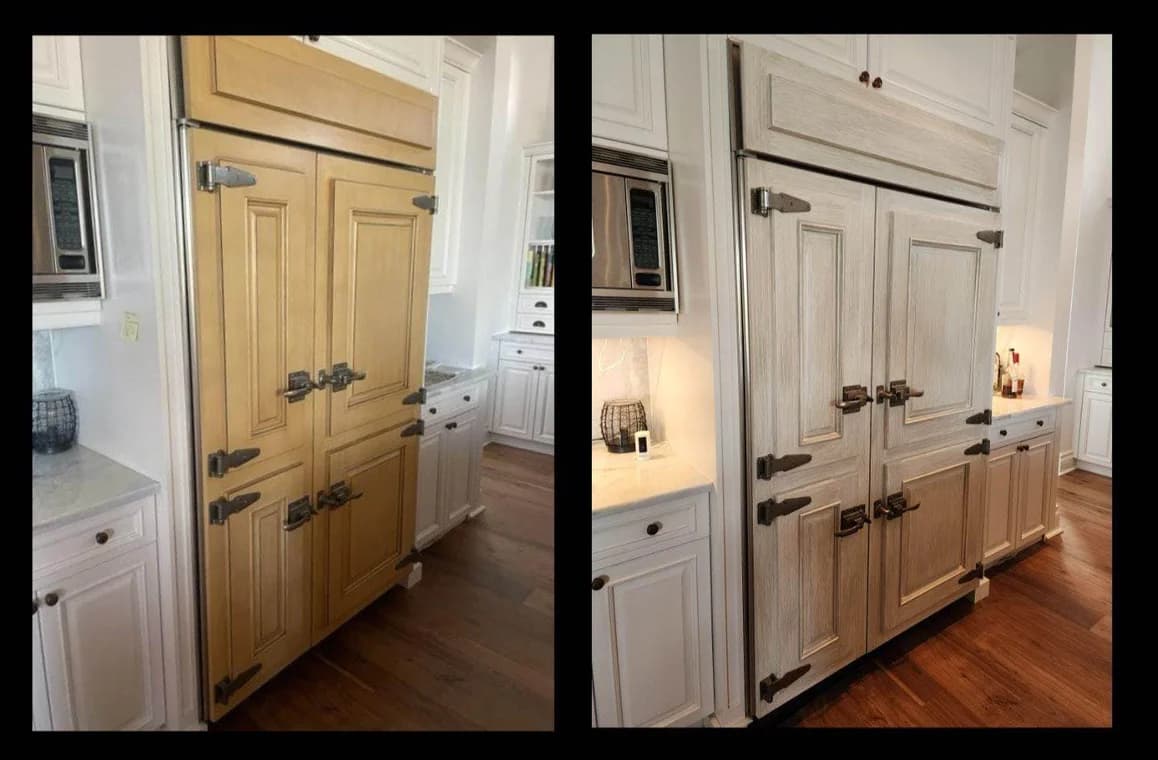 This is an image from Creative Colors And Design company, located in Naples, FL. The image is a before and after cabinet refinishing of built-in refrigerator panels in a luxury kitchen, transitioning from honey oak finish to a modern whitewashed wood grain by Creative Colors and Design