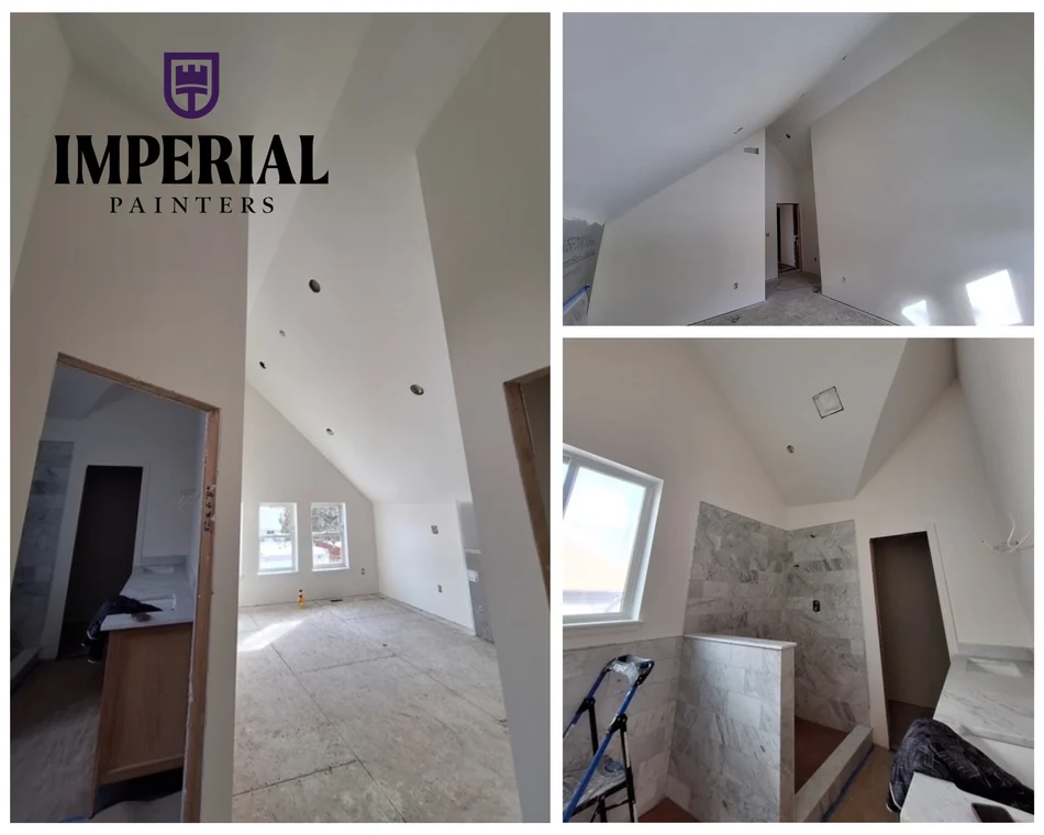 This is an image from Imperial Painters Company, located in Denver, CO The image is an Imperial Painters professional interior painting project showing freshly painted vaulted ceilings, smooth white walls, and updated bathroom with tile accents in a modern Denver home
