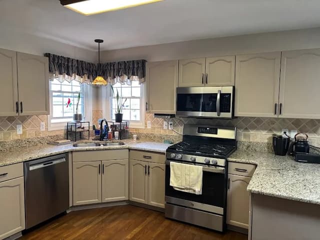 White Chooz Painters logo with blue background placeholder for paintig company logos